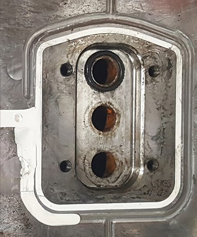 FIG 2 A core insert stuck inside a cavity.