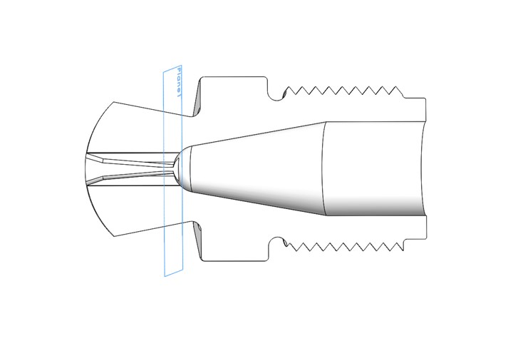 Cross-section of IMC nozzle tip shows tapered internal heat-sink fins, which start at the “transition plane,” which is where the solidified material separates from semi-solidified melt on part ejection. Also shown is the novel profile of the tip, which reduces thermal mass for improved temperature control.