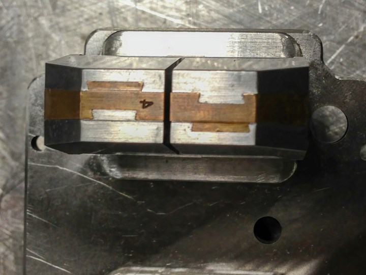 A core with twin beryllium copper dovetailed lifters.