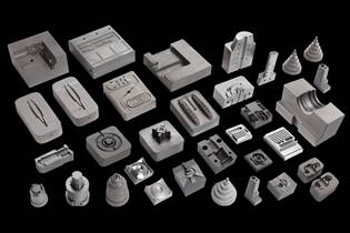 array of various metal AM-produced molds