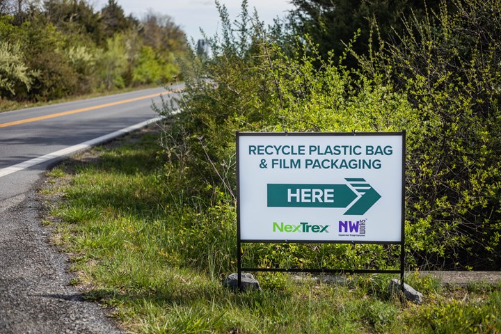 Sign identifying roadside recycling location. 