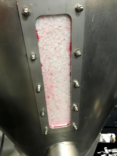 FIG 2 Material feed hoppers are sometimes underestimated in importance to color change. Use a vacuum wand to clean if possible. And don’t forget also to clean the feed zone of the extruder screw below the hopper.