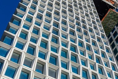 A photo showing the unique, sugar-cube façade of a building in NYC. Gate Precast created the concrete panels.