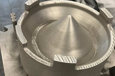 The cobalt-chrome sump cover for F110 engine was additively manufactured on a GE Additive Concept Laser M2 machine at the GE Additive Technology Center in Cincinnati, as part of collaboration with the U.S. Air Force’s Rapid Sustainment Office.