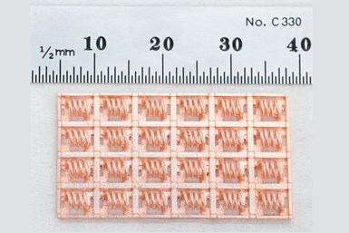 Micro inductor coils printed in a 24-piece array — 20 such arrays can be printed simultaneously on one Holo PureForm printer. 
