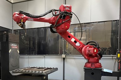 Example of a Lincoln Electric Additive Solutions robot, which offers considerable freedom over an enclosed machine when it comes to reaching around the work space to deposit material at different angles. Photo Credit: Lincoln Electric Additive Solutions.