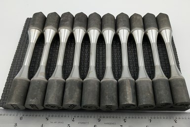 A photo of a series of Inconel 718 parts 3D printed and postprocessed through PECD.