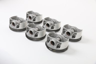 A photo of 3D printed pistons Mahle made for Porsche