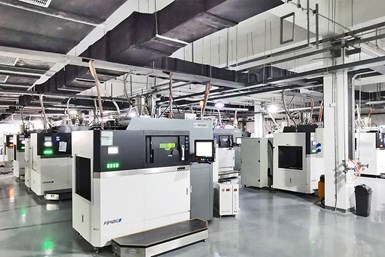 An array of 18-plus Farsoon FS421M metal systems are installed at Falcontech Super AM Factory. Photo Credit: Falcontech