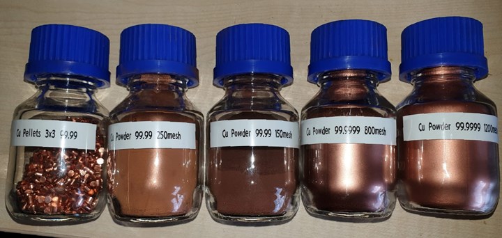 bottles of copper pellets and powder
