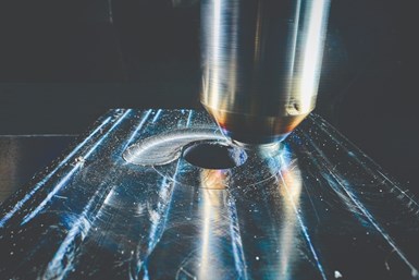 A rotating FSW tool plunges into the workpiece, dwells momentarily to enable rotation, friction and pressure to create a plasticized material pool, then traverses the workpiece to create the weld. Photo Credit: Mazak