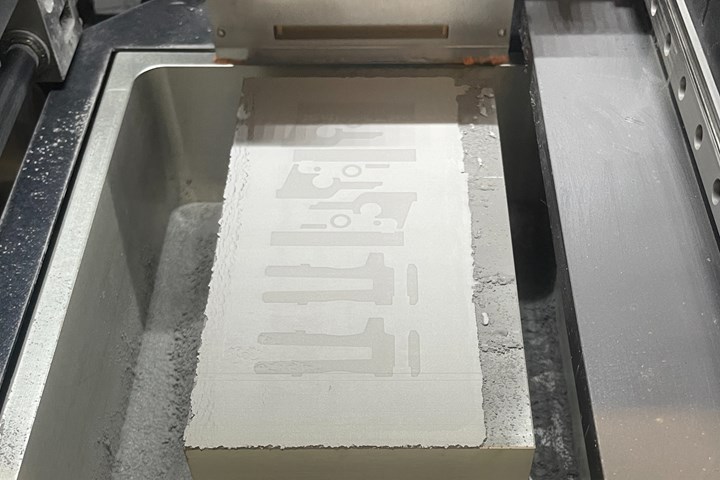 inside a binder jetting printer 