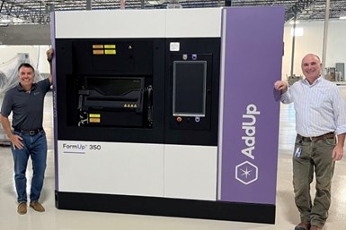 AddUp CEO Rush LaSelle and Zeda CTO Greg Morris welcome the placement of the first FormUp350 system at Zeda’s new 75,000-square-foot facility in Cincinnati, Ohio. Photo Credit: AddUp