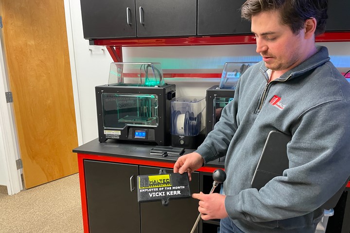 Adam Shields in front of Haltec’s PowerSpec Ultra 2.0 3D printers