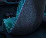 Thermoplastic composites incorporated into vehicle seatback concept