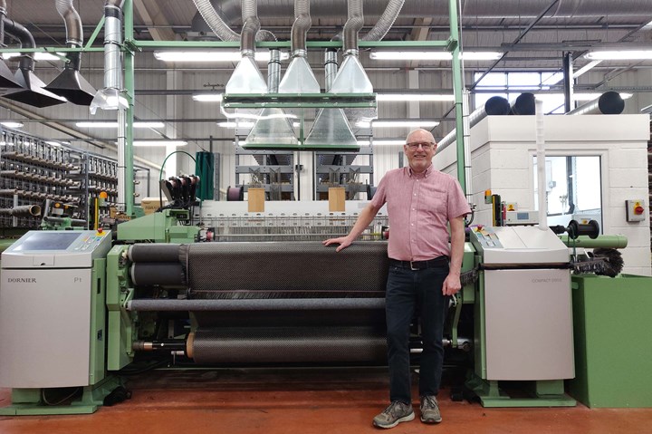 Martin Wood, weaving director at Antich and Sons, pictured with one of the single rapier weaving looms.