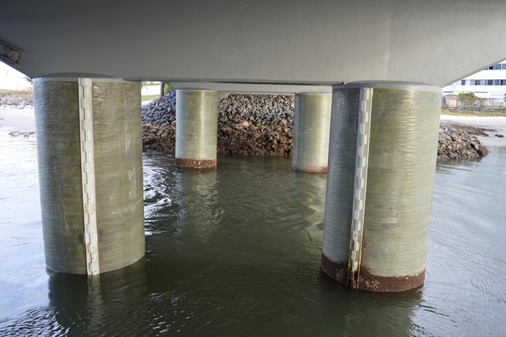 Bridge pier repair using the prefabricated fiber-reinforced jacket.