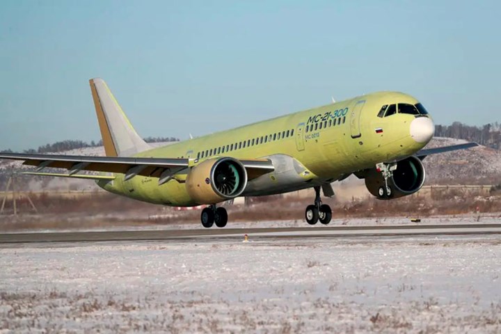 The MC-21-300 aircraft makes its first flight with its new composite infused wing.