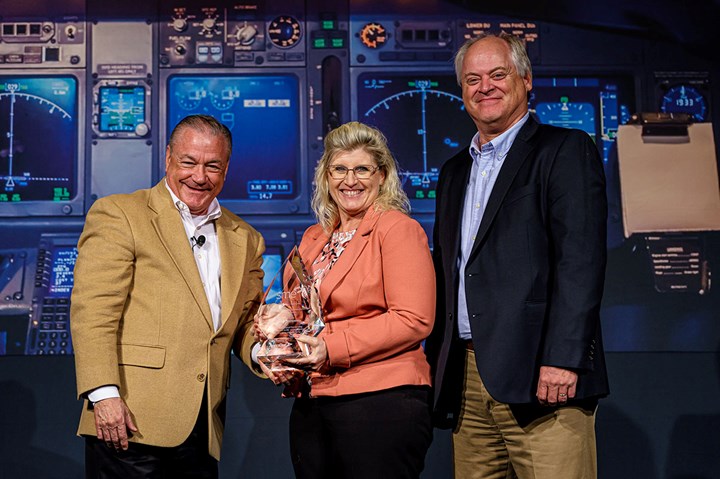 Spirit AeroSystems accepts the 2021 SME Award for Excellence in Composites Manufacturing (Large Company) Award.