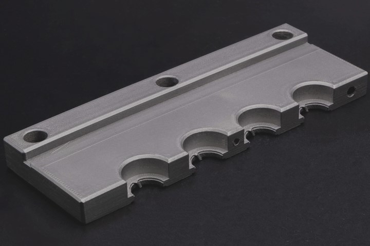 AIM3D printed and sintered slide produced in 8620 steel.