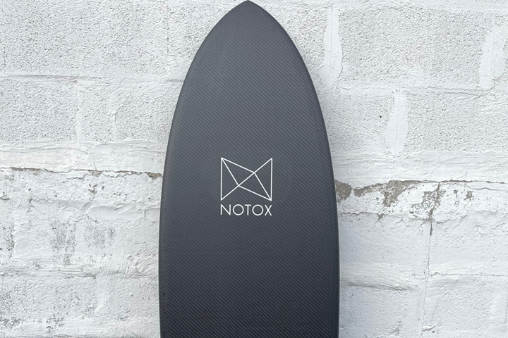 Notox sustainable composite surfboard.