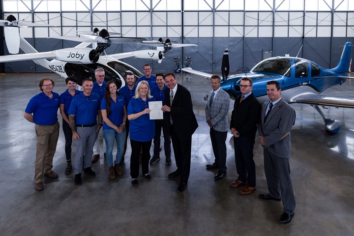 Joby’s air operations team pictured receiving the company’s Part 135 Air Carrier Certificate.