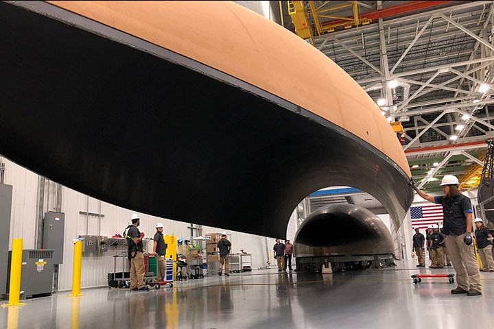 Carbon fiber payload fairing produced OOA by RUAG Space at its Decatur, Ala., facility.