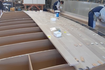Prefabricated composite panels, joining system ease catamaran construction
