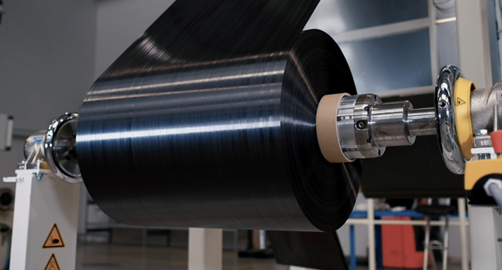 Teijin unidirectional thermoplastic tape line, spooled material