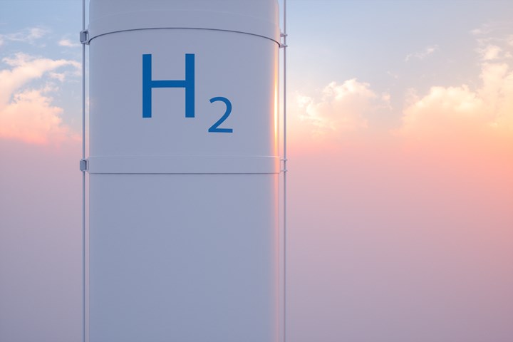 Hydrogen storage tank against sunset backdrop.