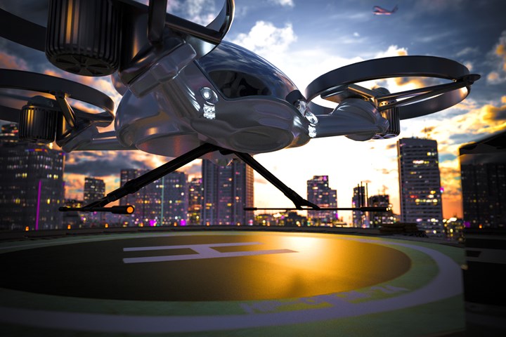 eVTOL ready to land on the roof tarmac.