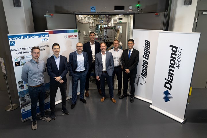 Representatives of the hydrogen project consortium in front of the test bench.