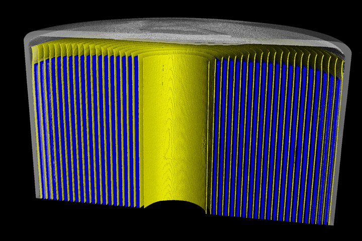 Exterior and interior CT-generated cut-away view of a battery prior to defect and structural analyses.