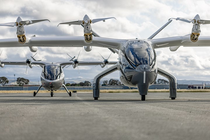 Midnight eVTOL aircraft sitting in a row on the tarmac.