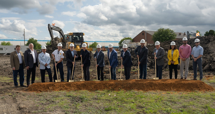 Cirrus management breaking ground with shovels.