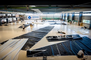 Incidence Sail employees work on Biotherm sails.