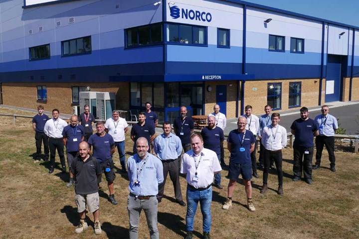Norco personnel standing in front of Winfrith facility.