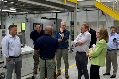 CW Team touring a KraussMaffei facility in Florence, KY