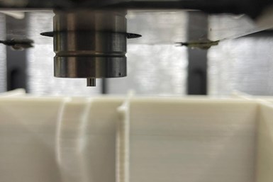 close-up of Massivit epoxy 3D printing system making a mold for fiberglass composite bathtub manufacturer Lyons Industries