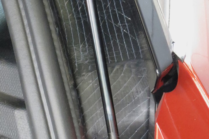 BMW i3 visible carbon fiber along hatchback edge