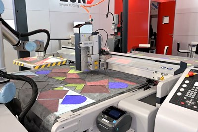 Intelligent, automated production methods for composites cutting, logistics