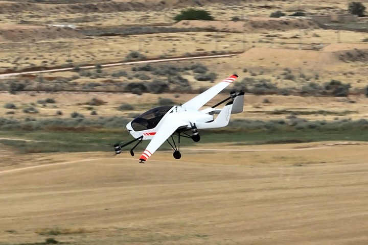 AIR One in flight in the desert.