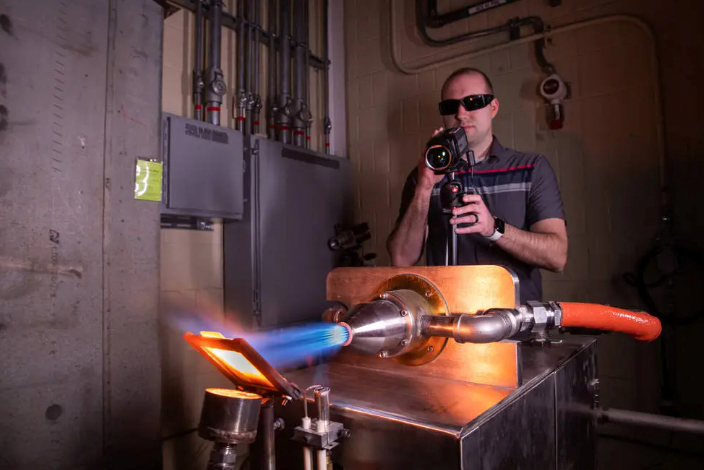 Engineer adjusts infrared thermal imaging camera.