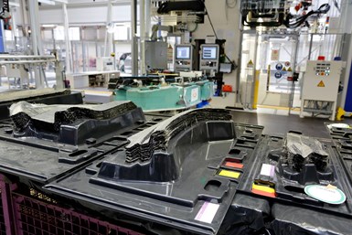 BMW i3 ply stacks in preform press