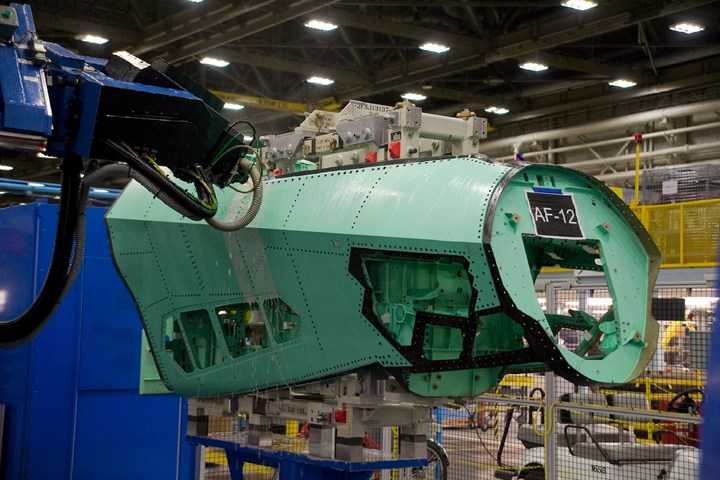 F-35 forward fuselage section, carbon fiber being drilled