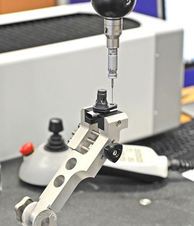 CMM touch probe with a part