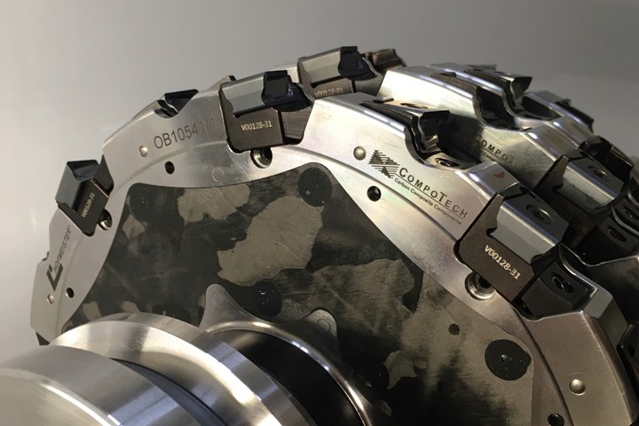 A close-up of a hybrid metal-composite disc-mill reveals four independent rows of cutting inserts. 