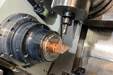 part being run on a live-tool CNC lathe 