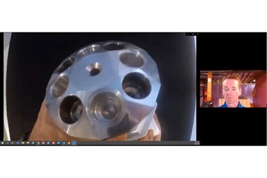 A screencap from a webinar Makino conducted with MMS, with Matt Nyer on the right while a video on the left shows him handling a prismatic aluminum part