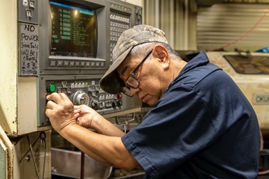 A stock of a OWSI machinist preparing a production operation